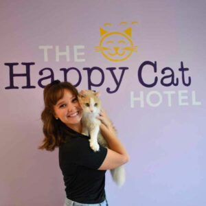 hotel staff with cat and logo
