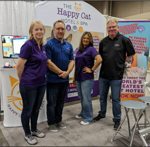 Happy Cat Hotel staff at trade show